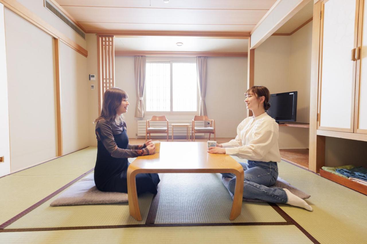 Ashibetsu Onsen Starlight Hotel Стая снимка