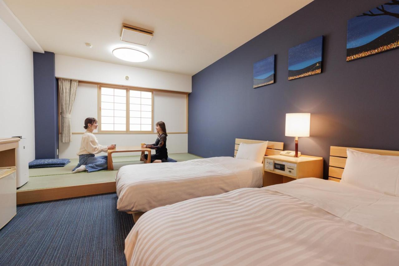 Ashibetsu Onsen Starlight Hotel Стая снимка