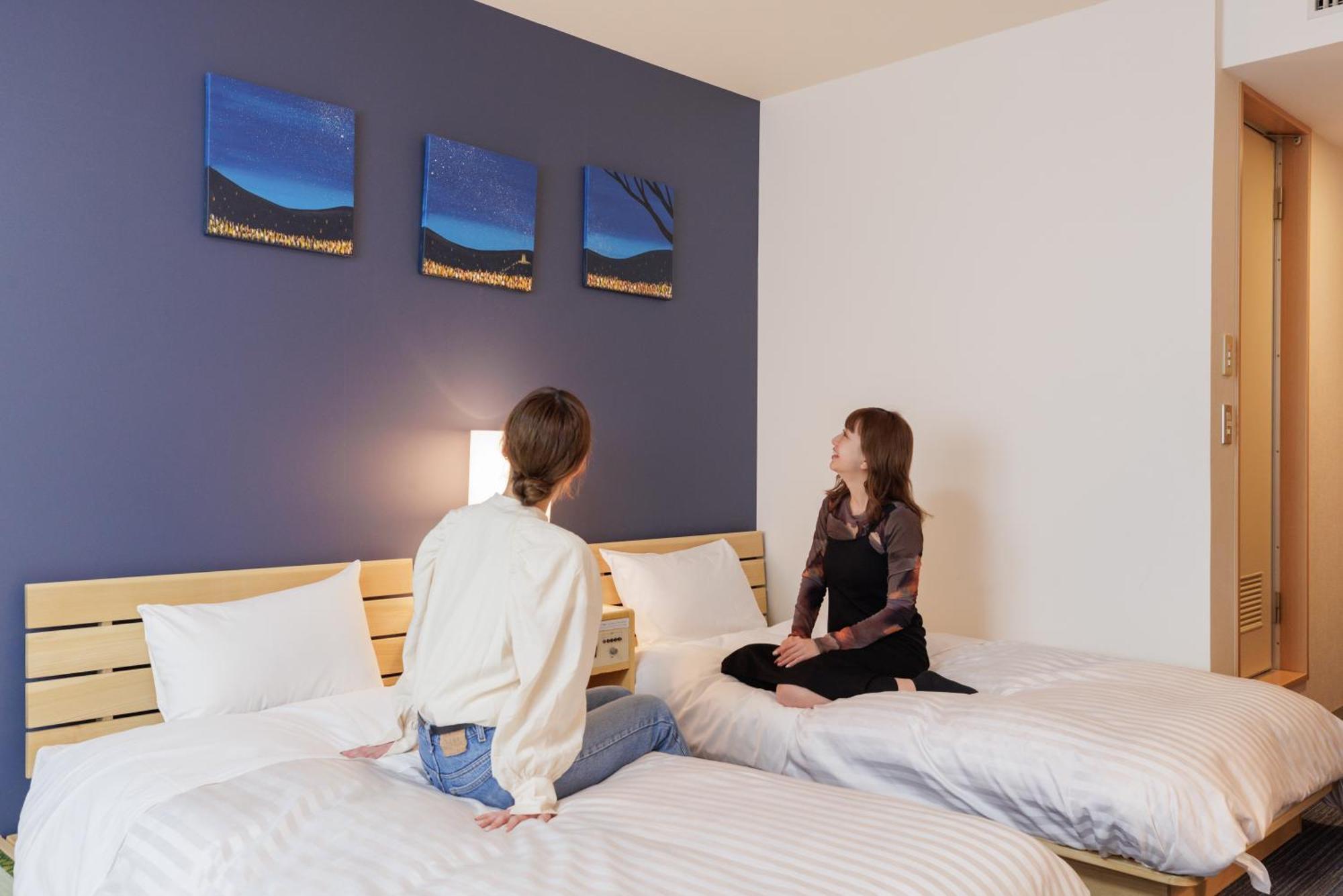 Ashibetsu Onsen Starlight Hotel Стая снимка