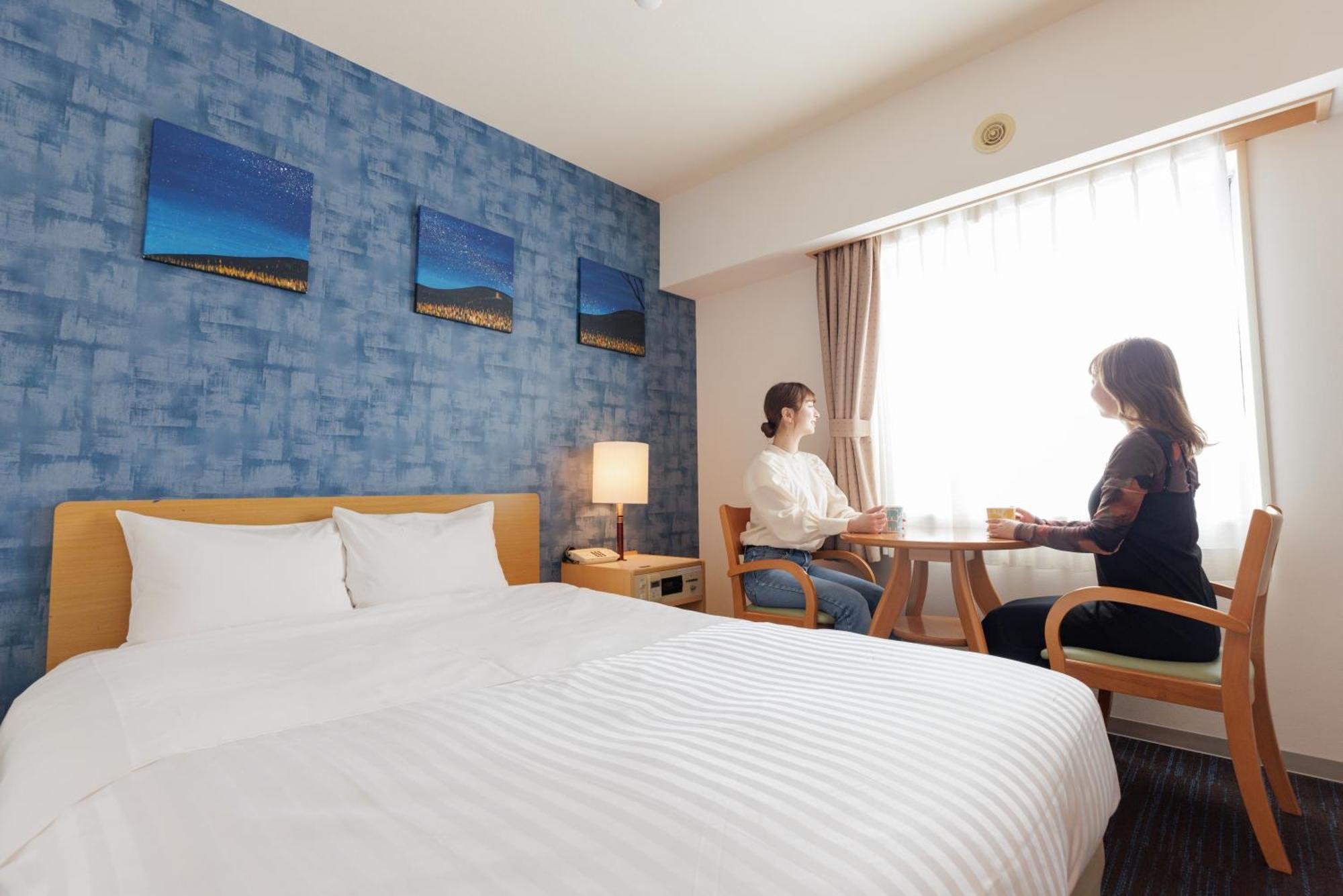 Ashibetsu Onsen Starlight Hotel Стая снимка